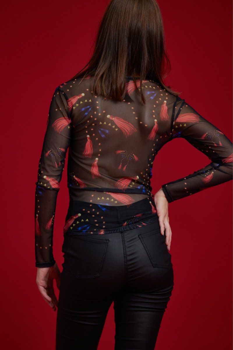 Blusa de malla con forma de corazón